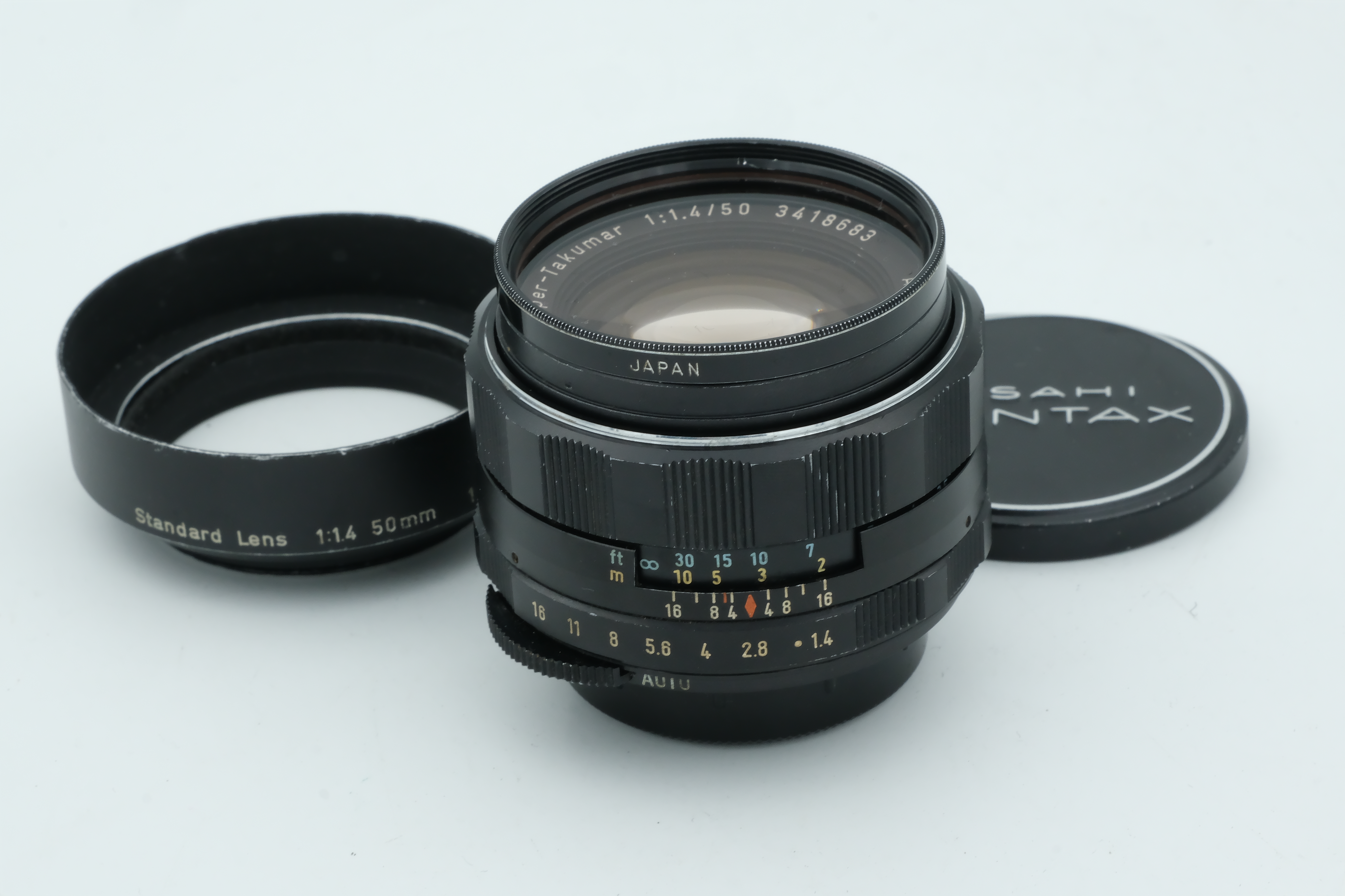 Pentax Super-Takumar 50mm 1,4 + Sonnenblende für M42 Bild 01